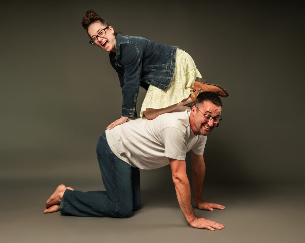 couple poses awkwardly for 90s style photo